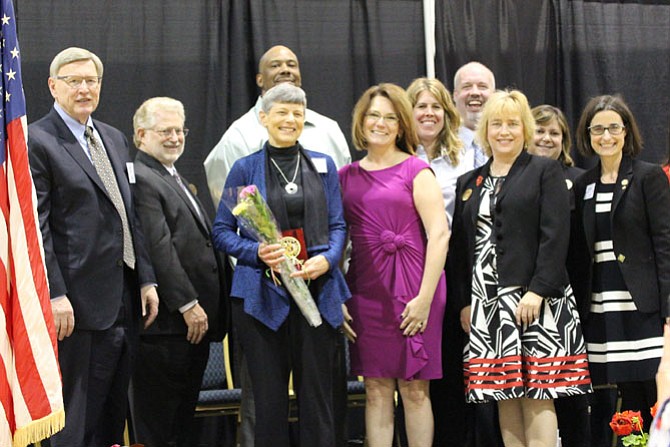 The Town of Herndon is seeking nominations for the 2018 Mayor's Volunteer Appreciation Awards. In 2017, Betty Eidemiller (center) received one of three Distinguished Service Awards. Pictured here at last year’s celebration are (from left) Dranesville District Supervisor John Foust (D); Herndon Town Councilmember Jeff Davidson; guest speaker Ravin V. Caldwell Jr.; award winner Betty Eidemiller; Herndon Mayor Lisa C. Merkel; Herndon Vice Mayor Jennifer Baker; Herndon Town Councilmembers Sheila Olem, Bill McKenna, and Signe Friedrichs; and Del. Jennifer Boysko (D-86).