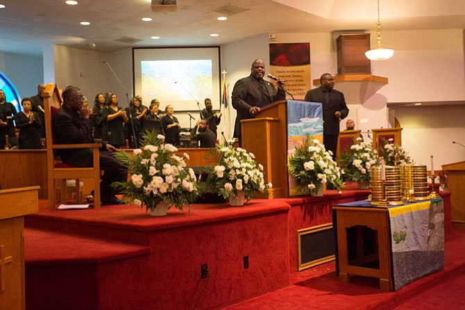 Rev. Vernon Walton (center), senior pastor, gives the sermon on Justice and Legislative Sunday at the First Baptist Church of Vienna Feb. 4.