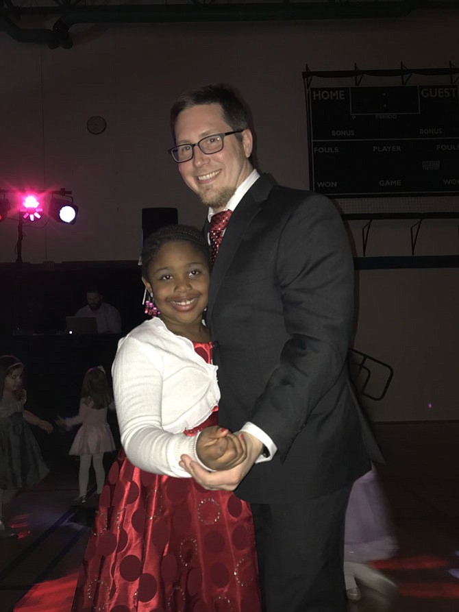 Shaela Mahoney, 7, of Herndon and her dad Devin shine as they hit the dance floor at Herndon Parks and Recreation’s Father Daughter Dance.