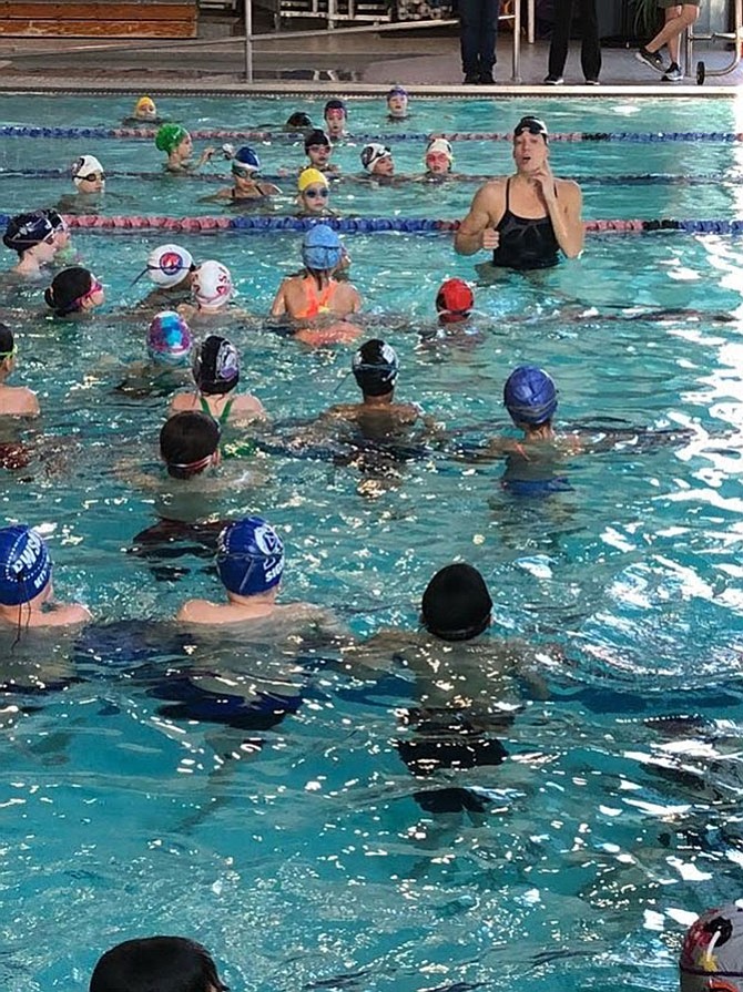 Three-time Olympic champion Amanda Weir leads a class at Chinquapin Park Recreation Center and Aquatics Facility.