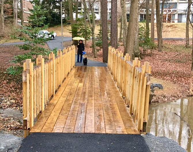 New bridge over stream at Hickory: Bridge designed by Mr. Youngren, a resident of Hickory Cluster.