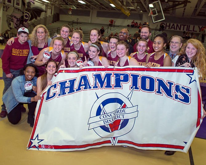 The Oakton Cougars defeated the Madison Warhawks 50-38 to earn the Concorde District Tournament Championship.