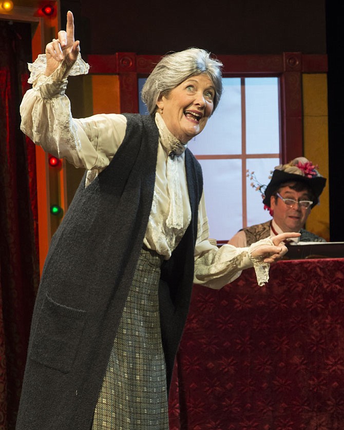 Catherine Flye is pictured from her role in “Christmas at the Old Bull and Bush” at MetroStage last December, shown with Music Director and Pianist Joe Walsh.