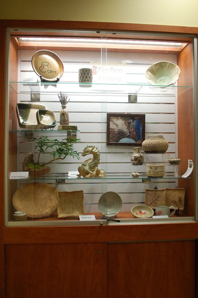 Pottery and other forms of clay work created by Laura Nichols’ students of Pig Pen Pottery.