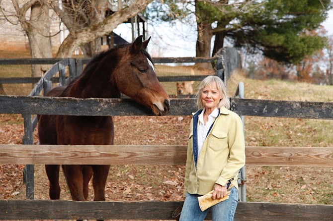 Carole Dell with Fatiyah, an Egyptian Arabian mare. Zina is in the background.