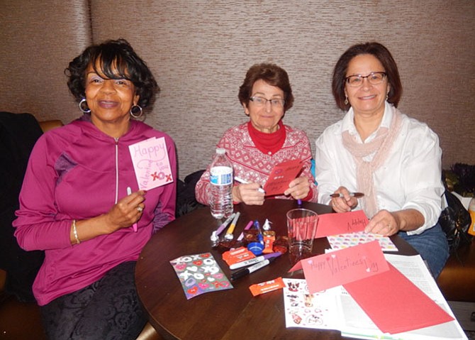 From left: Linda Andrews, Mary Marple and daughter Barbara Marple with some of the valentines they created.