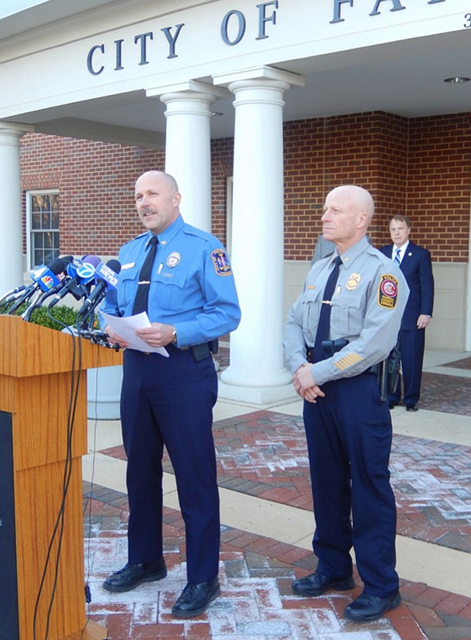 (From left) Fairfax City Police Chief Carl Pardiny and Fairfax County Police Chief Ed Roessler hold a press conference Monday evening about the arrest of a teen who allegedly threatened Fairfax High School.