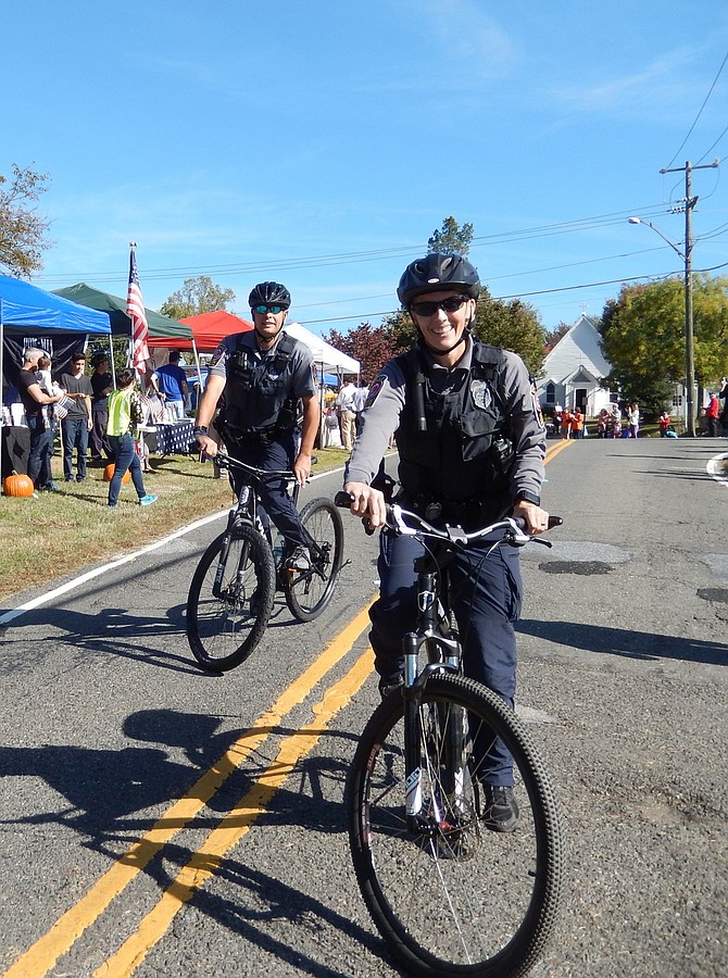 Sully District Police Station Bike Team members participating in the 2017 Centreville Day parade.