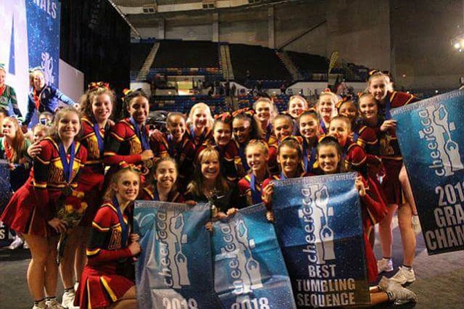 Bishop Ireton swept the Christian Cheerleaders of America’s (CCA) National Championships in Fayetteville, N.C. last month. The varsity cheerleading team has clenched this title for the third year in a row. The team took first place in tumbling, and in the Large Varsity Division in the music and non-music categories offered at the competition. The Cardinals became the National Grand Champions after receiving the highest score out of any division in the National Competition. At the competition, Cardinals Coach Angela Hope-Eskew, the 2012 CCA National Coach of the Year, was recognized for being in the CCA’s Coach’s Hall of Fame.