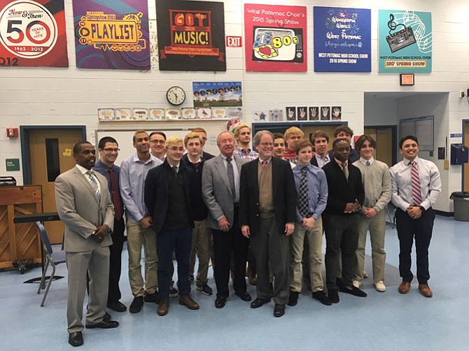 West Potomac High School wrestling coaches, Bruce Huester, Doug Clark, and team.