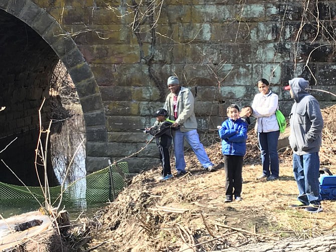 Narendra DaSari and his wife Krishna along with their son Sachin Marshall, 7, and his friend Harshul Chimpalli, cast their lines hoping for the big one at the Herndon Annual Kids Trout Fishing Derby. Andria Sias and his son, Cameron, 6 also try their luck.