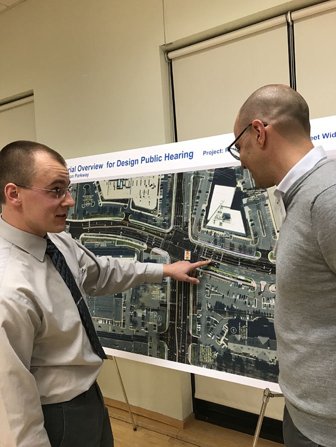 Wesley Foor and Federico Gontaruk, Location & Design VDOT discuss the proposed East Spring Widening Project at the Public Hearing held March­ 8, 2018. Citizen attendance was low; at times VDOT representatives outnumbered citizens.