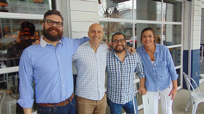 Bartaco employees Mike Weaver, General Manager; Sabato Sagaria, President; Francisco Sanchez, Beverage Director; and Marissa Fama, Bartender in front of the restaurant.