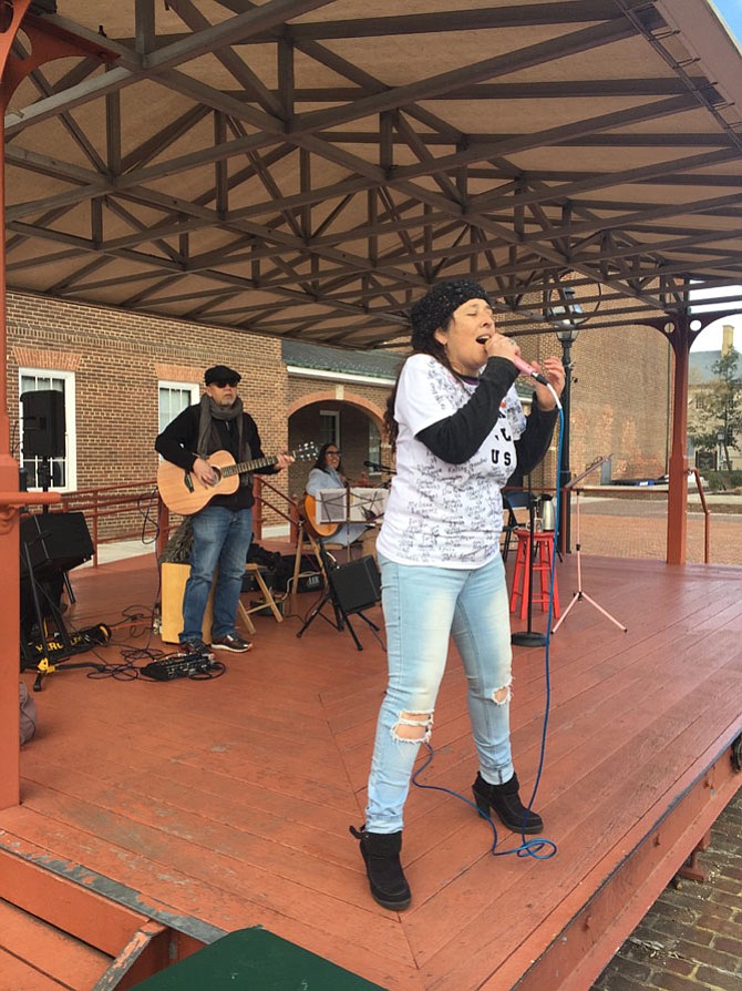 Elsa Riveros performing at Alexandria’s International Women’s Day rally.