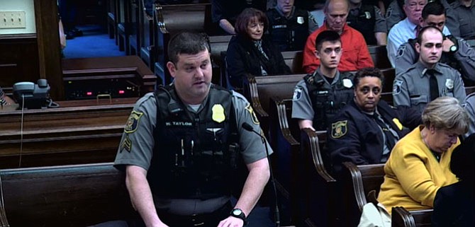 Officer William Taylor argues for higher emergency services pay before City Council.