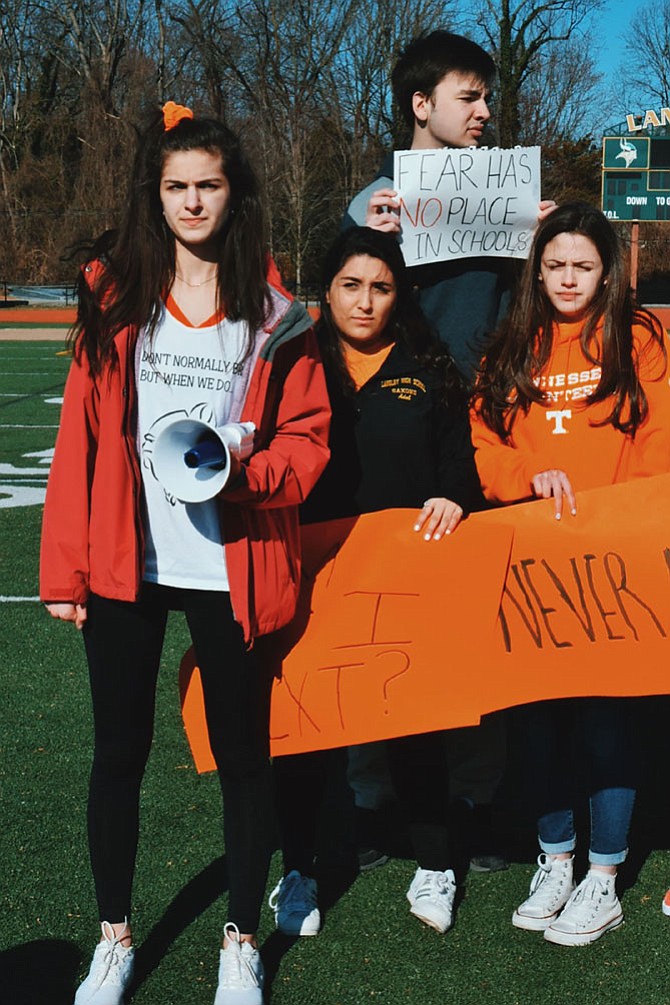 From left, Langley High School walkout co-organizer Alina Ghobadi stands with fellow students Roumina Adab, James Rau and Emily London. Profoundly affected by the school shooting in Parkland, Fla., that saw 17 students lose their lives to a teenaged gunman with an assault rifle, Ghobadi decided it was time to speak out for school safety and sensible gun regulations.
