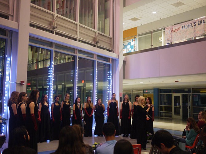 Something Extra performs in the atrium of Yorktown High School, providing a Q and A session with Yorktown’s Chamber Choir afterwards. Yorktown’s long-term substitute for the choir program, Kyra Klontz, is in the foreground.