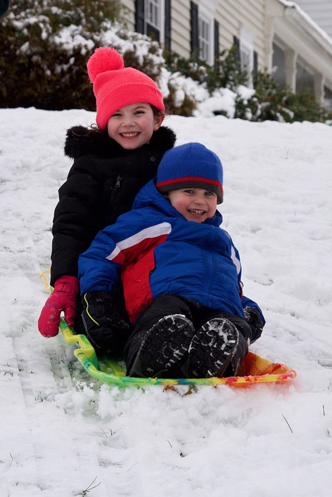 Harper and Owen Gottlieb are having fun in the snow in River Falls on March 21.