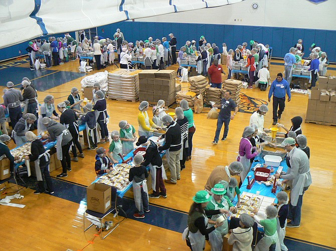 The Langley School community came together for the school’s first-ever Day of Giving on Saturday, March 17 to pack 75,000 meals for the people of Puerto Rico.