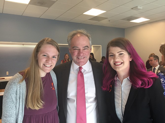 U.S. Sen. Tim Kaine (center) meets with students Laura Kirk (left) and Ella Wogaman from West Springfield High School.