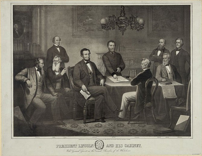 President Abraham Lincoln and his cabinet at the White House discussing the draft Emancipation Proclamation.