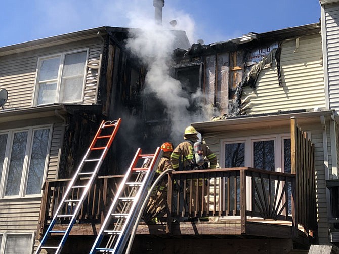 Two dogs and the occupant safely evacuated the home prior to fire department arrival.