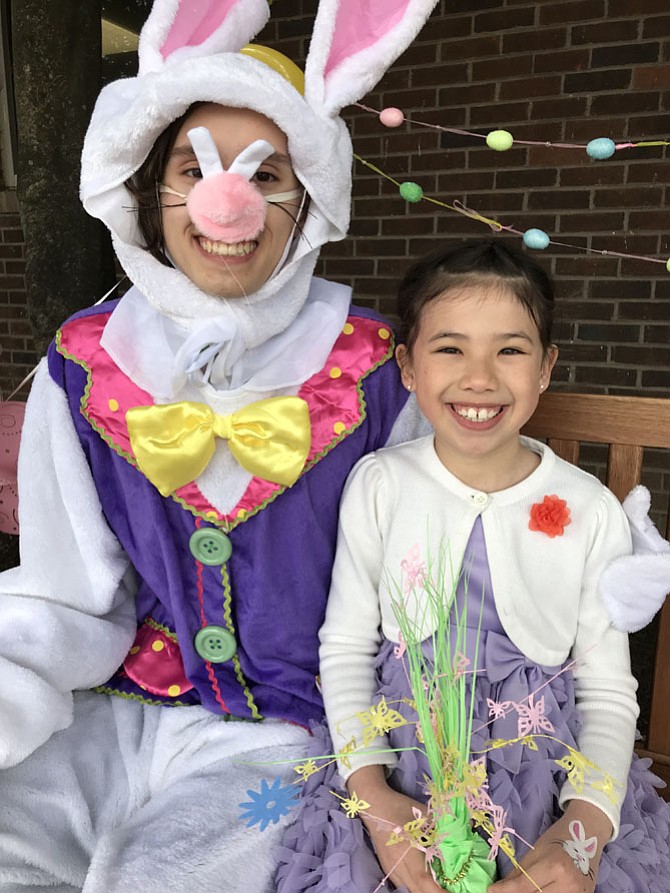 Amber Yin was more than happy to sit beside the ubiquitous Easter Bunny after Easter Services Sunday morning at Restoration Church, the Reston campus of Floris United Methodist Church. Worship services are held each Sunday at 10 a.m.