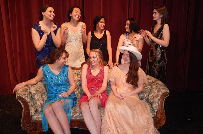 Rehearsing a scene are (standing, from left) Emily Draut, Annie Silva, Elise McCue, Valerie Mellard and Molly Marsh, and (seated, from left) Caroline Woodson, Lauren Spiers and Kylee Downie.