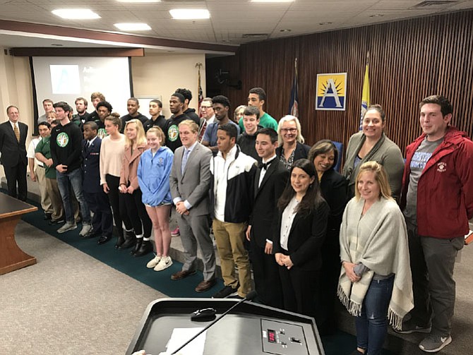 Winter sports state finalists with Arlington School Board and Staff.