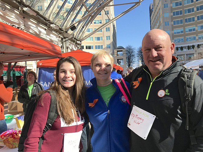 Troy and Tory Santymire, 12, of Centreville are at the Walk MS Reston event to support wife and stepmom, Allison Santymire, who has MS.