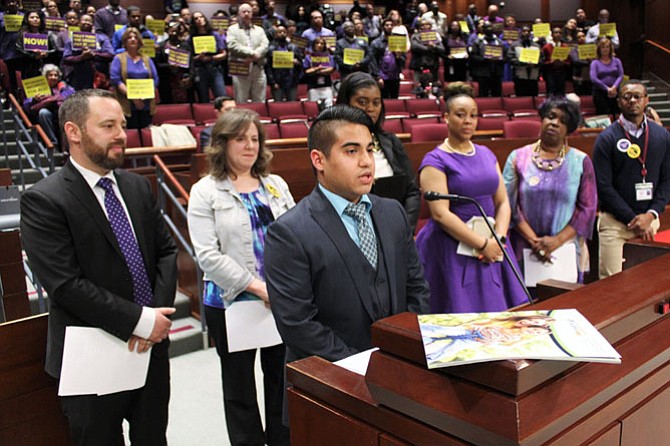 Enrique Carrero, Fairfax County employee standing with many union members, says that as a millennial, he cares very much about retirement benefits.