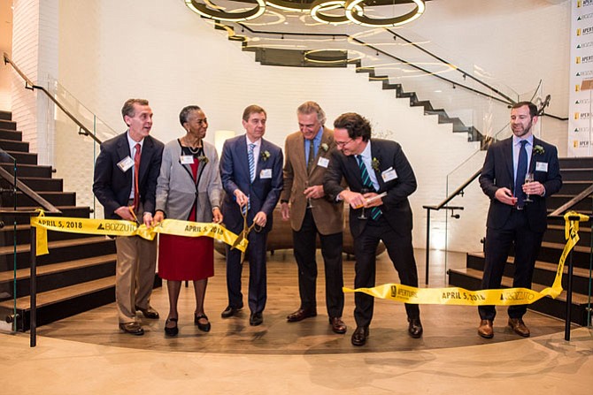 Official Ribbon-Cutting at the Aperture Grand Opening Celebration. From left: Casey Veatch, Veatch Commercial Real Estate; Supervisor Cathy Hudgins (D-Hunter Mill); Chuck Veatch, The Charles A. Veatch Co., joint venture developer of Aperture; Tom Bozzuto, Chairman, The Bozzuto Group; Toby Bozzuto, President and Chief Executive Officer, The Bozzuto Group; Mike Henehan, Senior Vice President, Managing Director for Bozzuto Development Company. Aperture Apartments, a six-story, 421-unit luxury building in Reston is across from the Wiehle-Reston East Metro station.