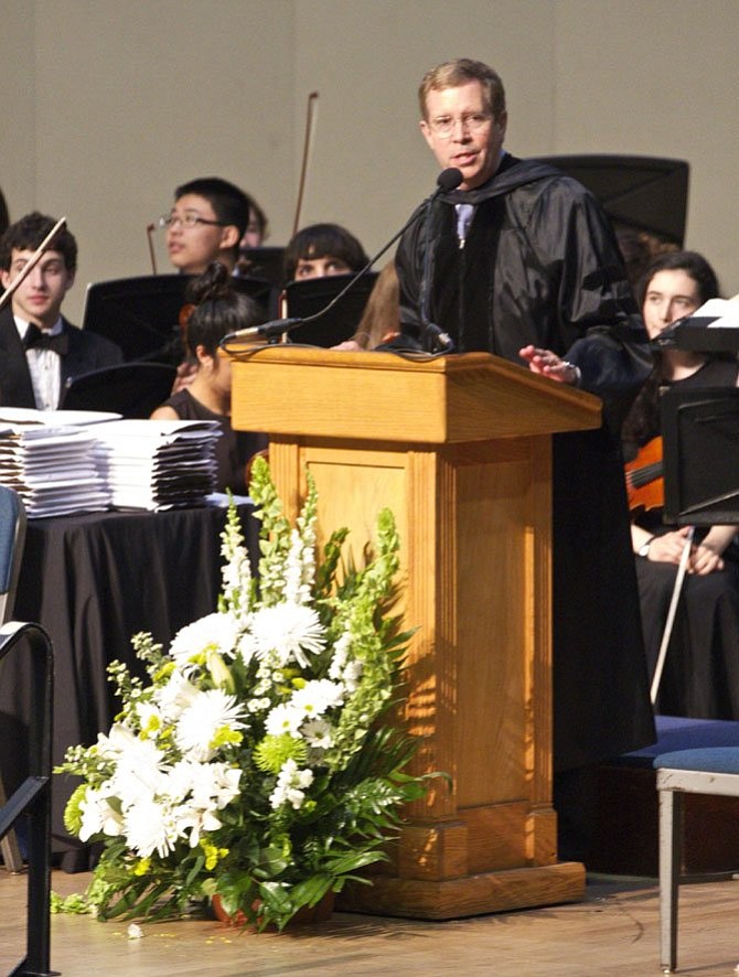 Walt Whitman High School Principal Dr. Alan Goodwin addresses the students and guests at the June 7, 2013 graduation.