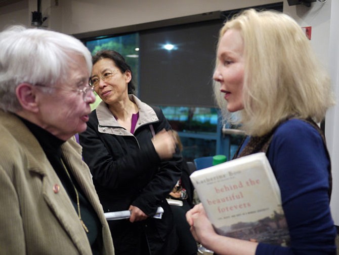 Katherine Boo was surprised at the reading by a former school principal, Mickey Moore, from her hometown, Alexandria.