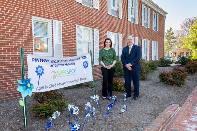 Michele Thames, executive director of SafeSpot, with Tim Sargeant, external affairs manager for Dominion Energy.