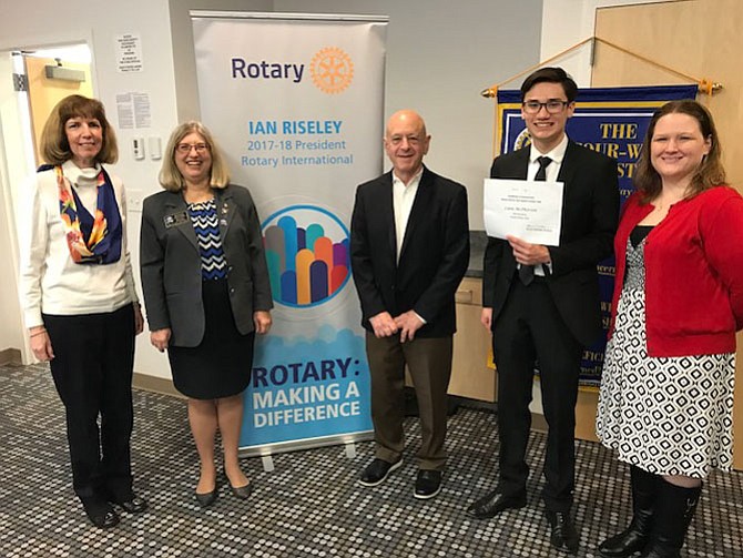 Fairfax High School Junior Liam McPherson won the Rotary District 7610 Speech Contest. Pictured from left are: Paula Brown Kelley, Past President of Fairfax Rotary, Rotary 7610 District Governor Ronnie Chantker, Barry Gordon, Fairfax Rotarian and Speech Contest representative, Liam McPherson, Speech Contest winner, Heather Davids, FHS Forensics (Speech) Coach.