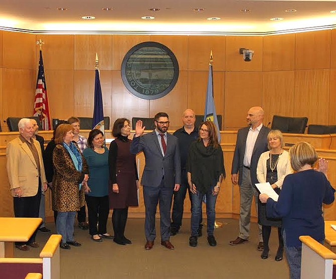 David Stromberg is officially sworn in as the Zoning Administrator of the Town of Herndon during a brief ceremony at the Herndon Town Chambers Tuesday, April 17, 2018.