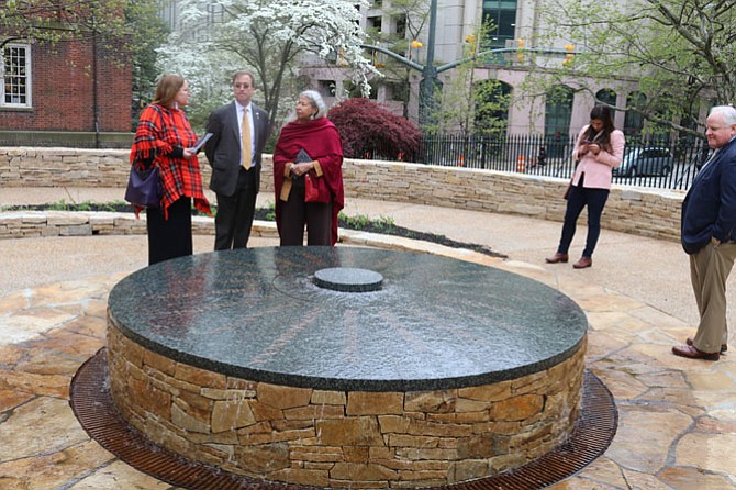 Running Strong for American Indian Youth Executive Director Lauren Haas Finkelstein, left, and Running Strong General Counsel Paul Krizek, with Chief Lynette Alston of the Nottoway Tribe at Mantle following the ceremony. Mantle is located on Capitol Square on the grounds of the Virginia State Capitol in Richmond.