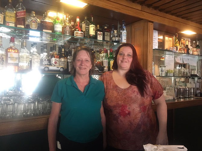 Behind the bar, Michelle Riggleman, right, and wait staff Kat McGowan are working to preserve the home-style restaurant.