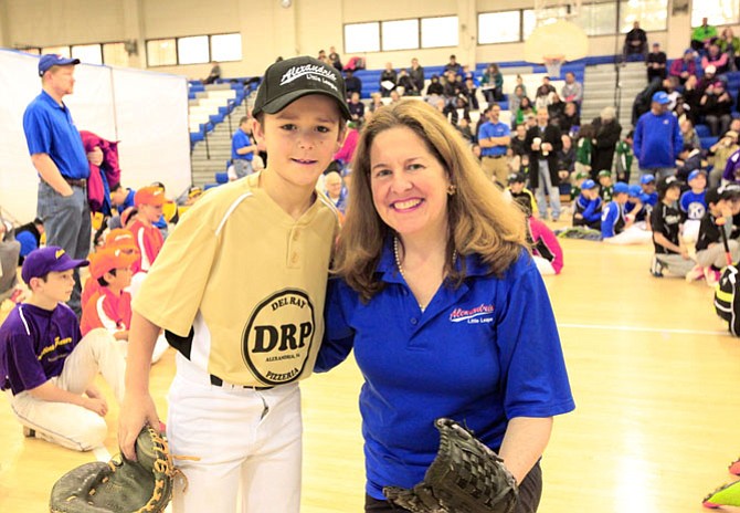 Mayor Allison Silberberg threw the first ceremonial pitch capping off Alexandria Little League’s 2018 season, with 11-year-old player R.J. Davis.