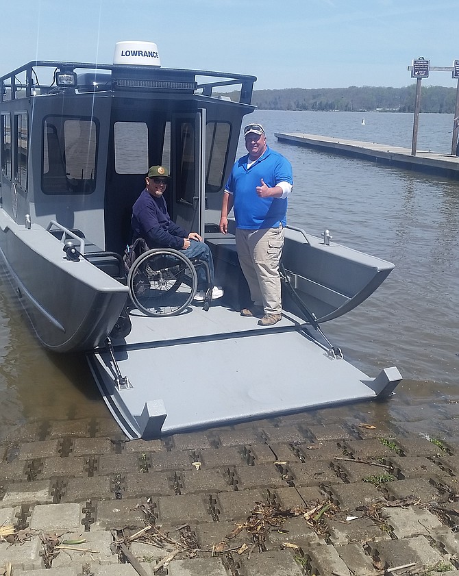 Ed Moore (left), U.S. Marine and founder of Veterans Fishing Adventure in Pohick Bay Regional Park, with Mike, a fellow U.S. Marine veteran.