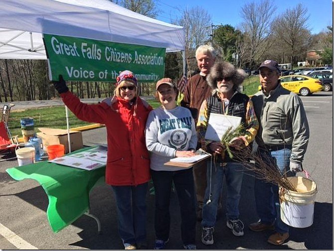 Great Falls Citizens Association volunteers at work in the the previous 2017 tree sapling program.