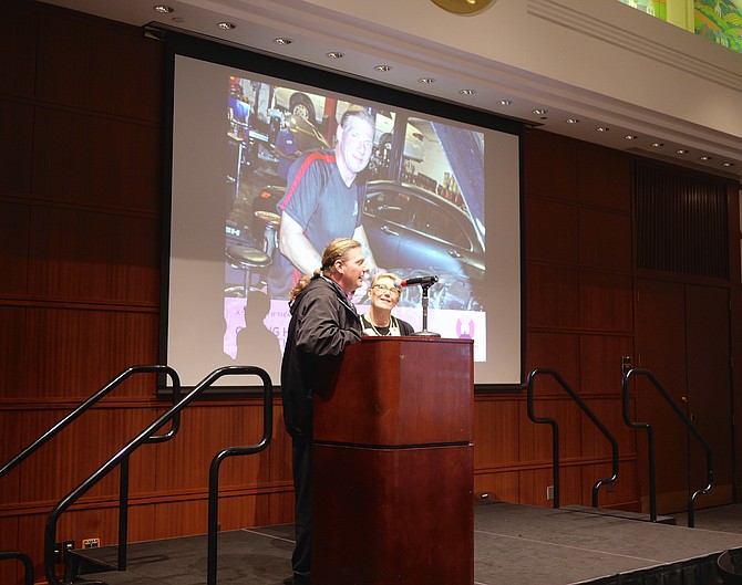 Kathy Siebert introduces Kenneth Florence to the audience at A-SPAN Coming Home breakfast.