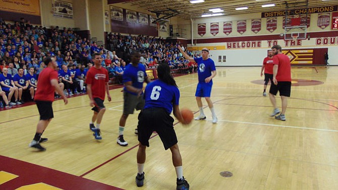 The staff from Mosby Woods challenges Providence Elementary Schools. The final score was 67-57, with Mosby Woods the winner.