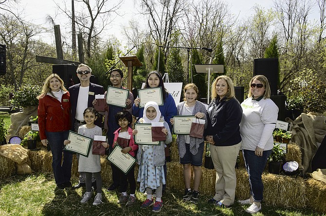 From left, back row: Roberta Longworth, Fairfax County Park Foundation Executive Director; Lane Brooks, Fairfax County Park Foundation Board Treasurer; Sagar Gupta, eighth grader at Rachel Carson Middle School; Jasmine Carlos, eighth-grader at Holmes Middle School; Kate Schlageter-Prettyman, fifth grader at Fairhill Elementary School; Sara Baldwin, Deputy Director of the Fairfax County Park Authority; and Cristin Bratt, Deputy Public Information Officer of the Fairfax County Park Authority. Front row: Kenzy Abdelmoneim, a first grader at Medina Montessori School; Zoya Quraishi, kindergarten homeschool student; and Lubabah Qazzaz, fourth-grade homeschool student.