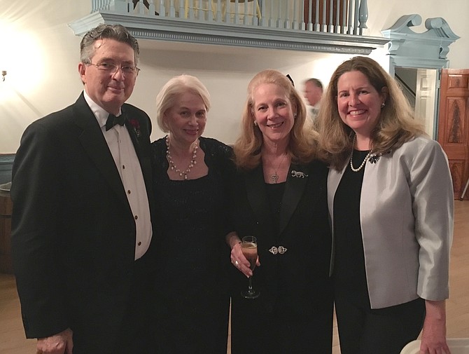 Mayor Allison Silberberg, right, poses for a photo with Kay and Terry Zerwick and Nancy Kegan Smith at the Gadsby’s Tavern Museum Society’s Springtime in Paris fundraiser April 14 at Gadsby’s Tavern. Kay Zerwick served as gala chair and Smith is president of the organization.