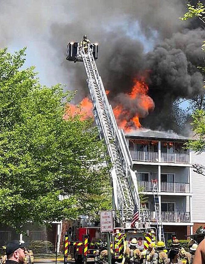 Firefighters battle the blaze at Forest Glen in Centreville.