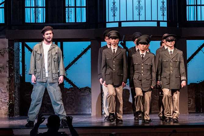 From left:  Mark Bosset, Peter Fox, Leland Hao, Samuel Buroker in Langley High production of ‘Evita.’