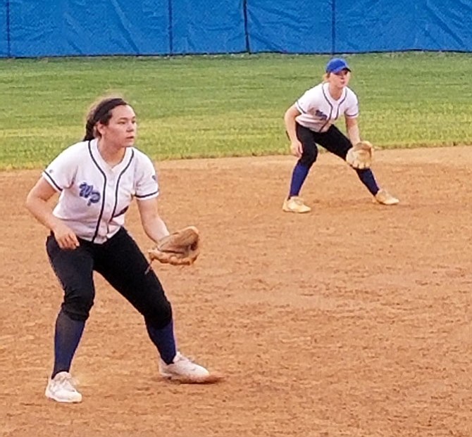 Third baseman Jennavieve Miller, left, and shortstop Katie Jo Moery are two of the West Potomac softball team’s top producers.