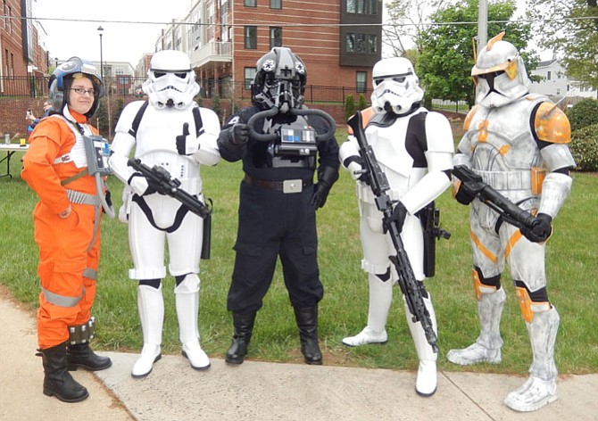 Members of 501 Legion portray Star Wars characters (from left) an X-Wing pilot with the Rebel Legion, a stormtrooper, tie pilot, another stormtrooper and Commander Cody.